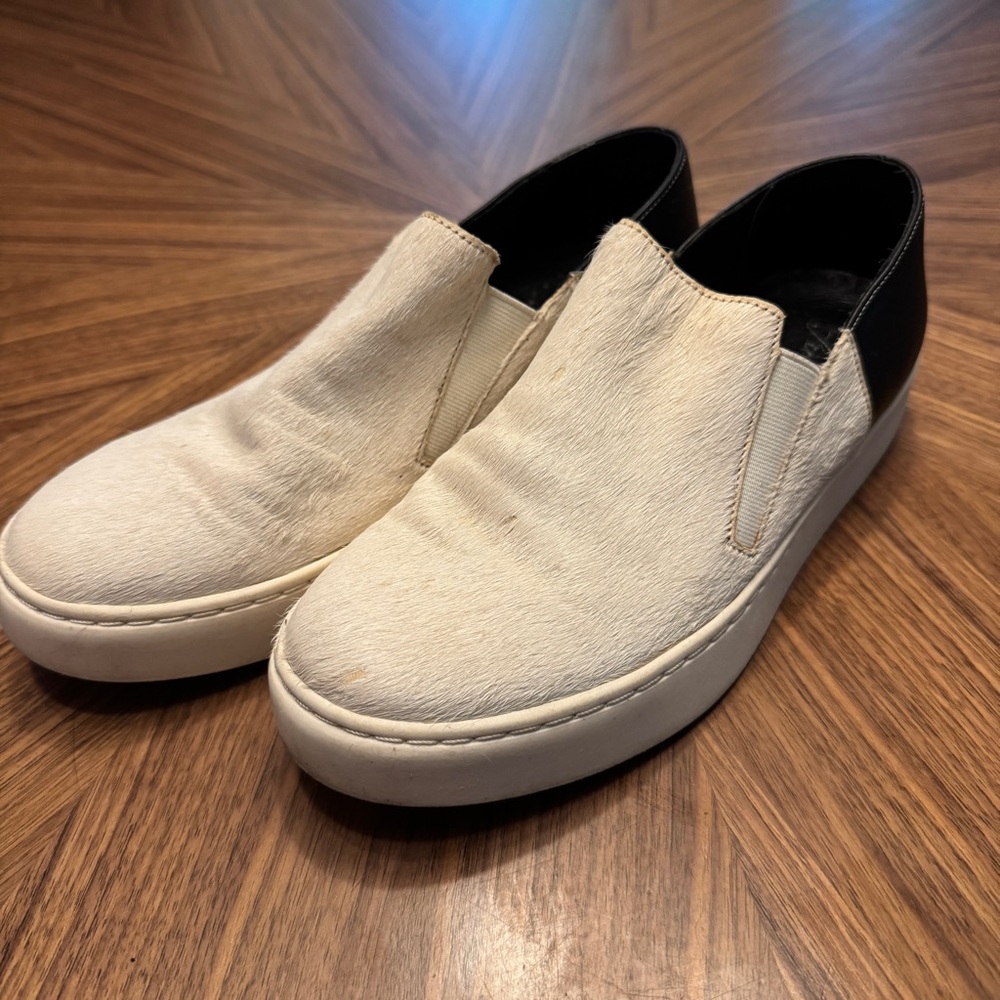 Free People Black and White calf’s hair Slip-On Shoes.